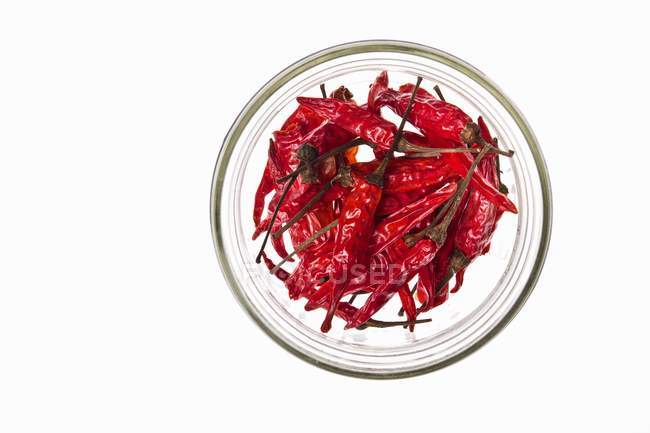 Dried chillies in bowl — Stock Photo