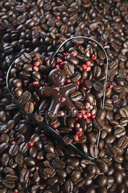 Chocolate figure on coffee — Stock Photo