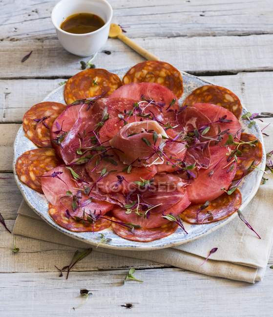 Assorted salami and ham — Stock Photo