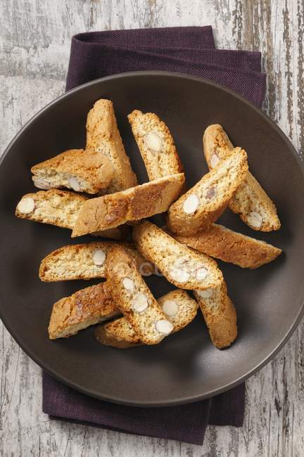 Top view of Biscotti in dark brown bowl — Stock Photo
