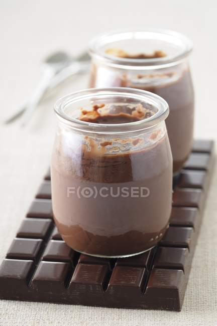 Glass Jars of chocolate pudding — Stock Photo