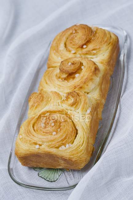 Puff pastry brioche with sugar nibs — Stock Photo