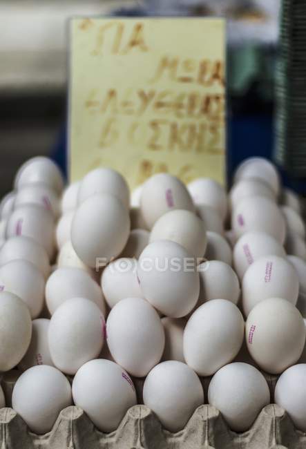 Fresh white eggs in egg box — Stock Photo