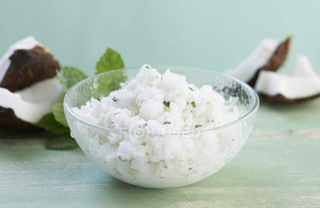 Closeup view of coconut Granita with mint in bowl — Stock Photo
