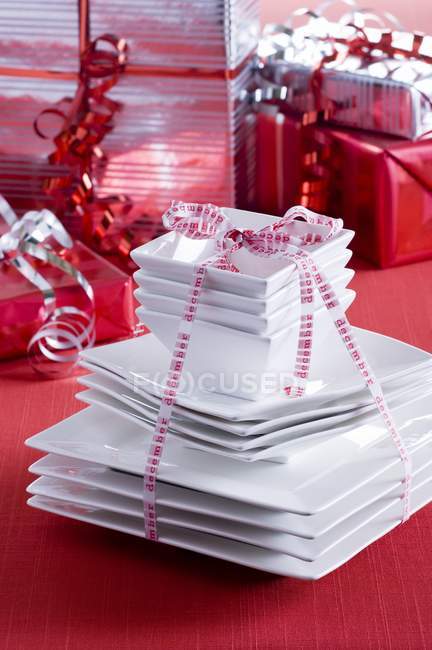 Crockery decorated as Christmas present — Stock Photo