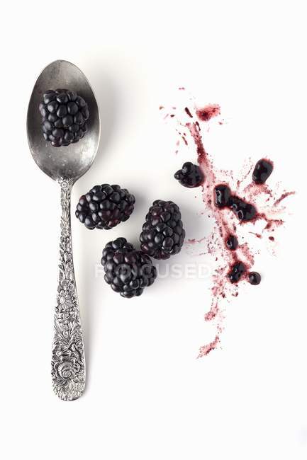 Blackberries with vintage spoon — Stock Photo