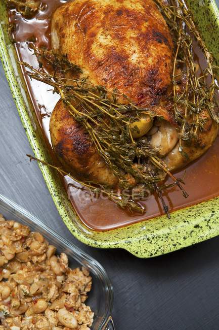 Roasted chicken with thyme — Stock Photo