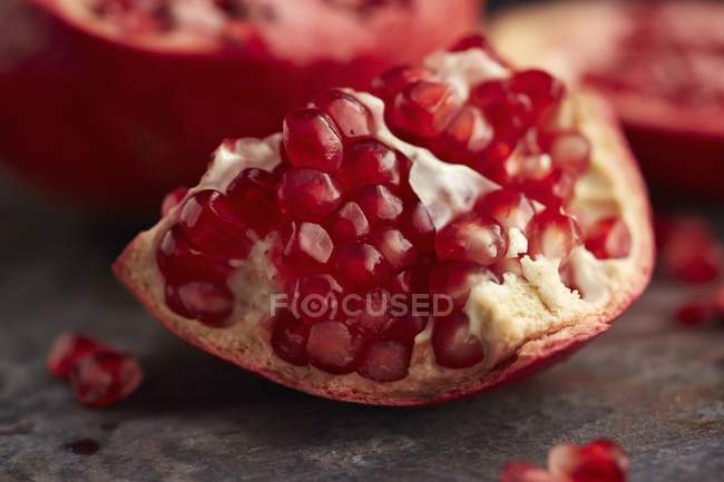 Red pomegranate piece — Stock Photo