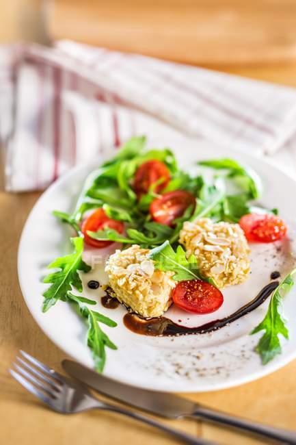 Salad with goat cheese — Stock Photo
