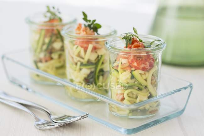 Courgette salads with crayfish and pine nuts — Stock Photo