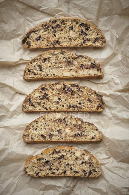 Top view of Biscotti slices on piece of brown paper — Stock Photo