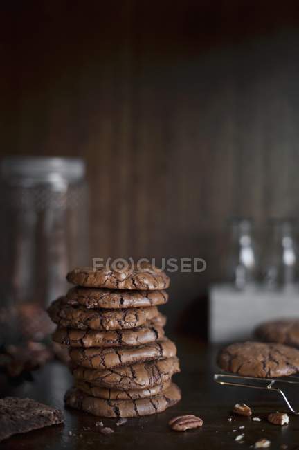 Stack of chocolate and pecan cookies — Stock Photo