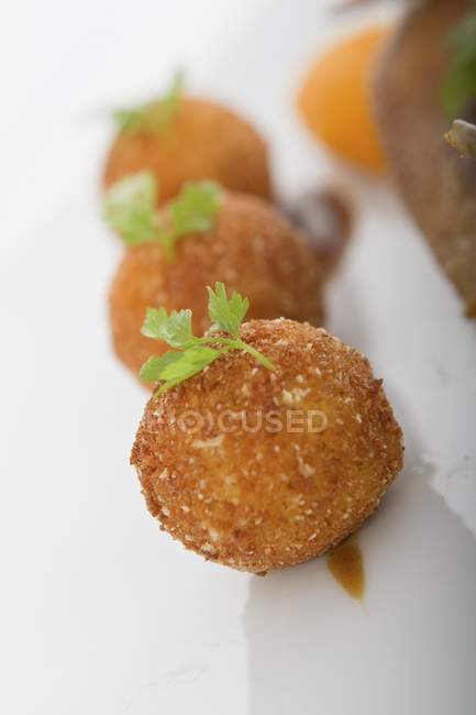 Potato croquettes with parsley — Stock Photo