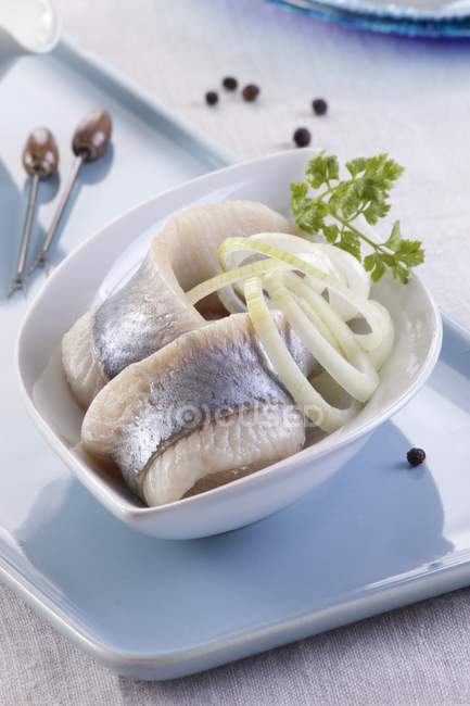 Herring fillets with onions — Stock Photo