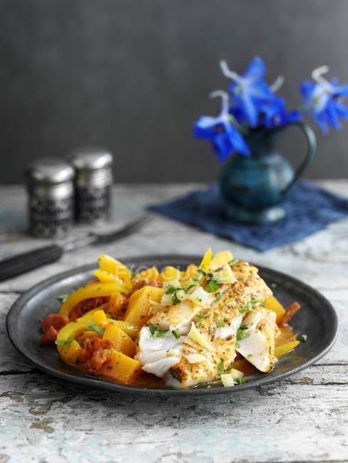 Closeup view of fish Tagine with lemons — Stock Photo