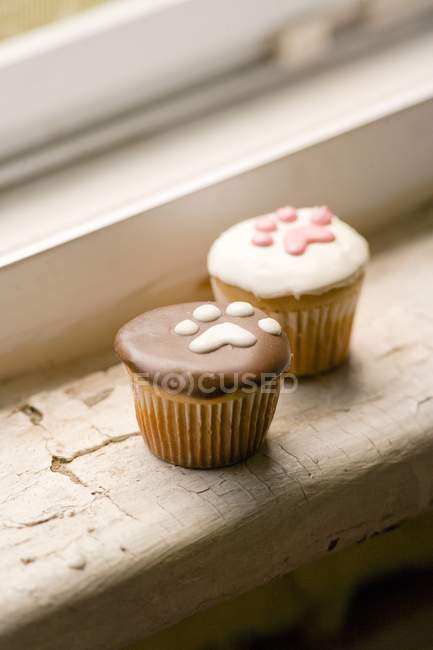 Cupcakes decorados com impressões de pata — Fotografia de Stock