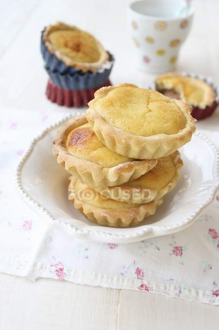 Stack of almond tartlets — Stock Photo