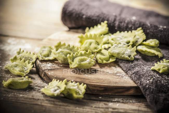 Green raviolini surface — Stock Photo