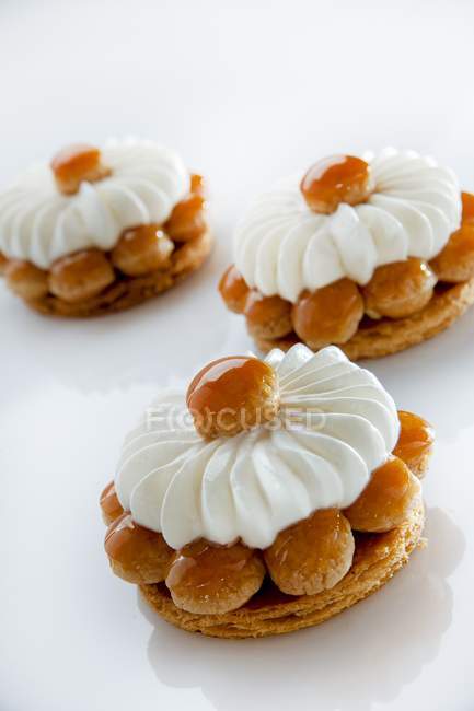 St. Honore cakes with honey — Stock Photo
