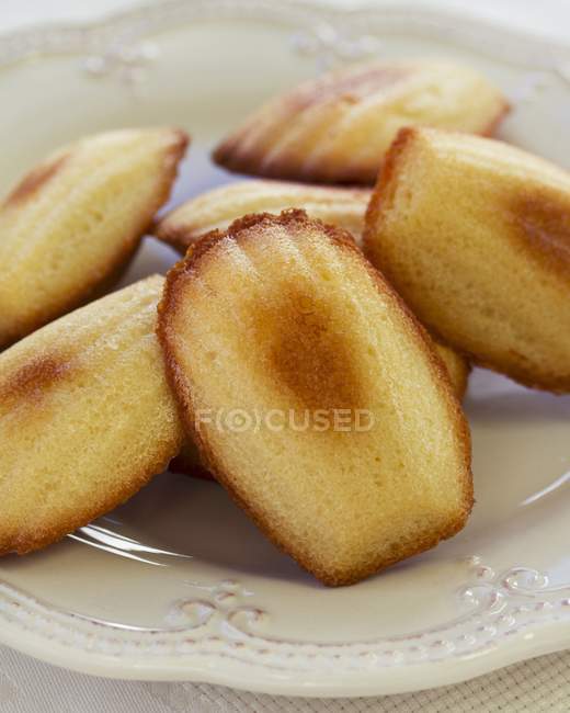 Baked Madeleines on plate — Stock Photo