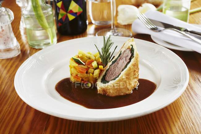 Saddle of lamb with spinach — Stock Photo