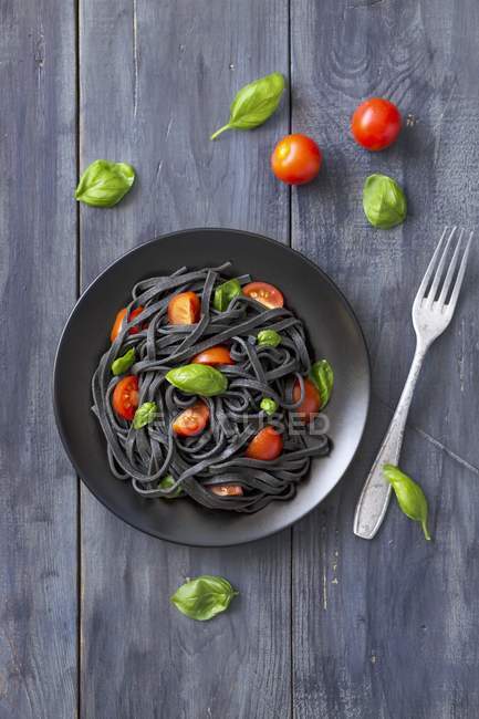 Black squid ink linguine pasta — Stock Photo