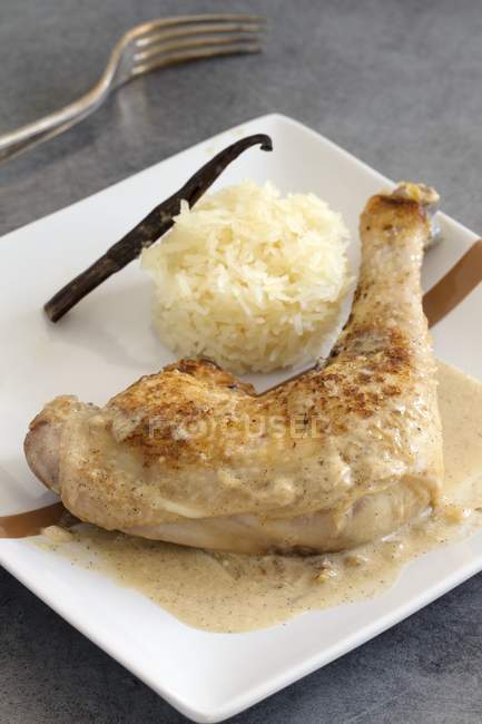 Chicken leg with sticky rice — Stock Photo