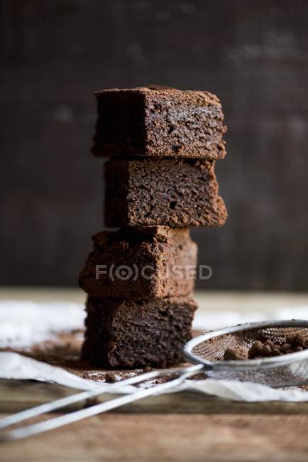 Stack of fresh baked brownies — Stock Photo