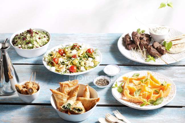 Various starters in bowls — Stock Photo