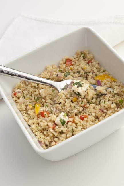 Couscous salad with peppers — Stock Photo