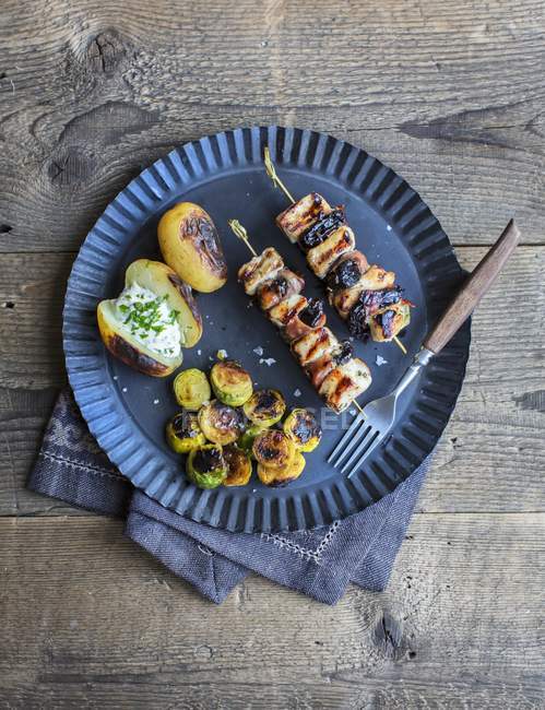 Pork and bacon skewers — Stock Photo