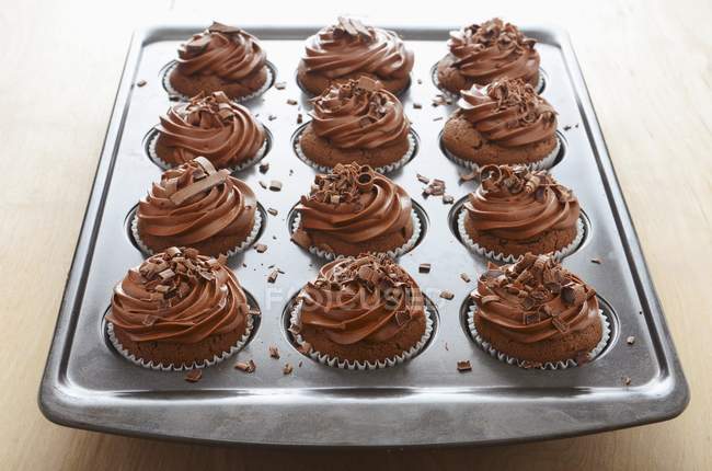 Chocolate cupcakes with butter cream — Stock Photo