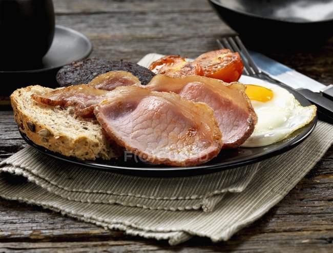 English breakfast with black pudding — Stock Photo
