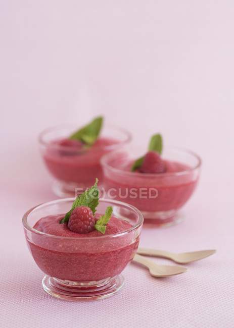 Bowls of raspberry mousse — Stock Photo