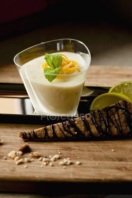 Citrus cream with biscuits — Stock Photo