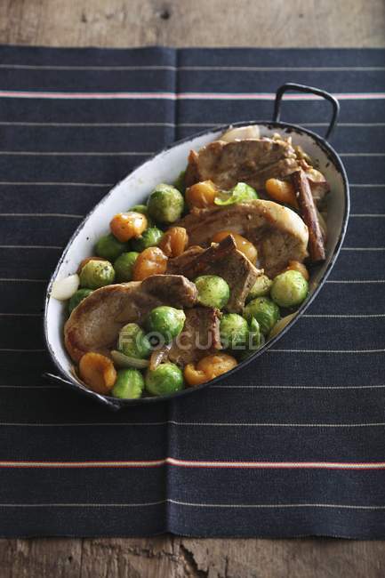 Pork chops with sprouts — Stock Photo