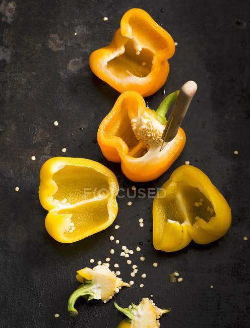 Halved yellow peppers — Stock Photo