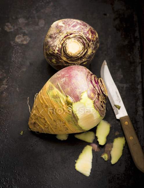 Partially peeled fresh Turnips — Stock Photo