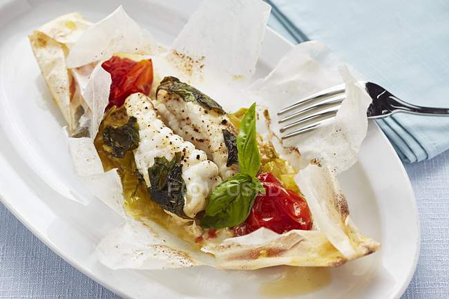 Cod cooked in parchment — Stock Photo