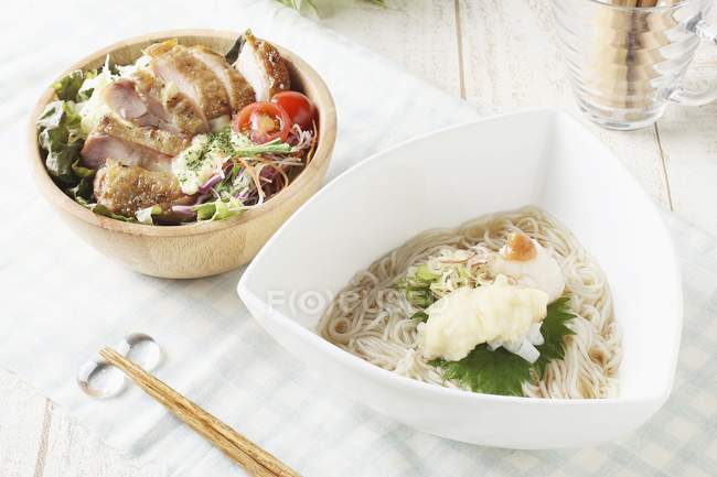 Thin wheat noodles and salad — Stock Photo