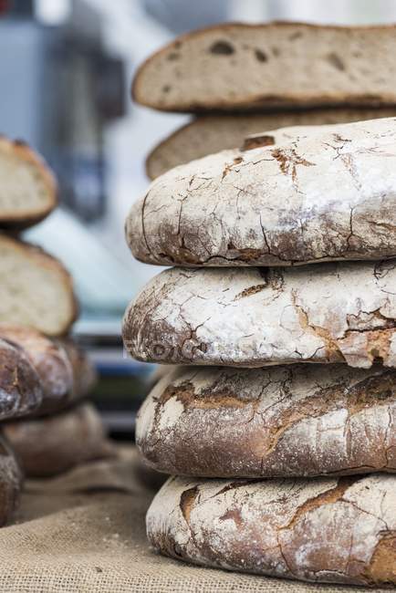 Stacks of bread in bakery — Stock Photo