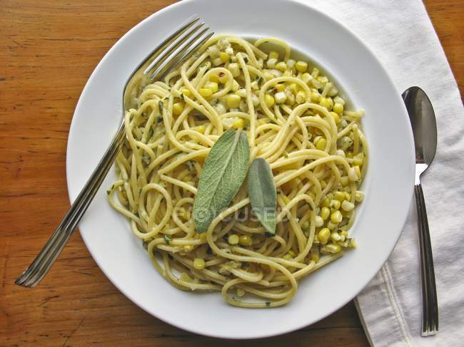 Spaghetti pasta and corn salad — Stock Photo