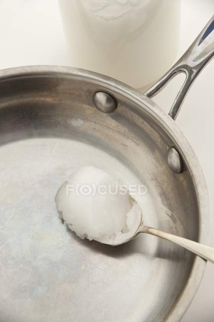 Spoonful of coconut fat — Stock Photo