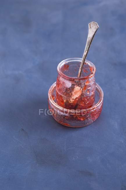 Empty jar of strawberry jam — Stock Photo