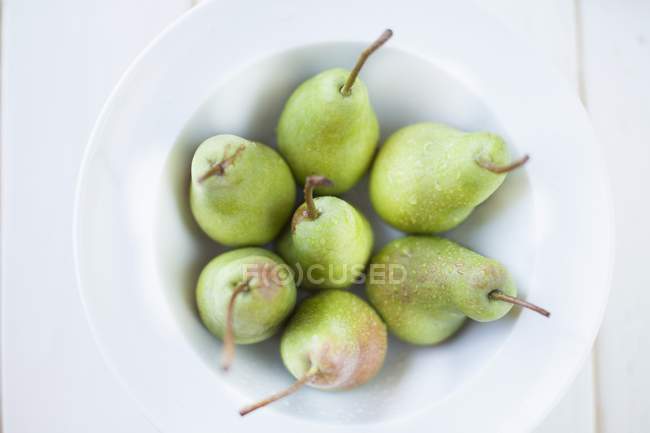 Tigela de peras frescas — Fotografia de Stock