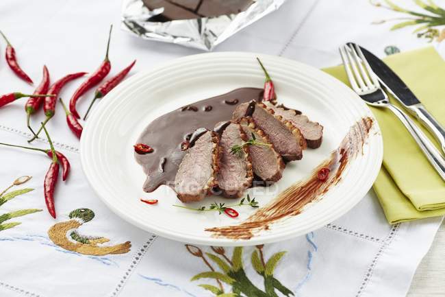 Sliced Duck breast with chilli — Stock Photo