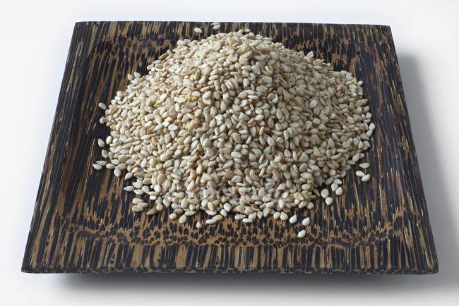 Sesame seeds on dish — Stock Photo