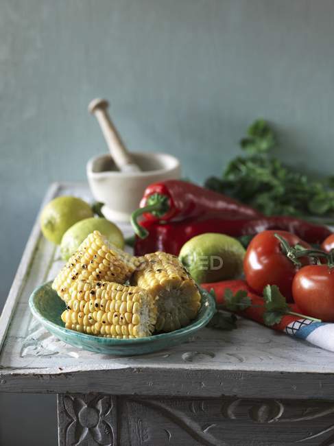 Cobs, tomatoes, peppers — Stock Photo