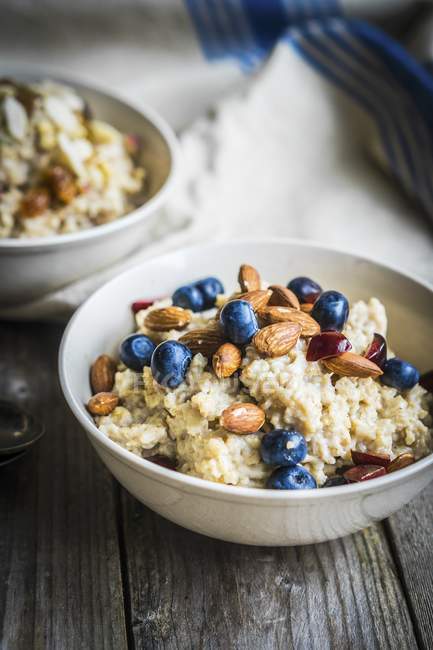 Porridge with blueberries and almonds — Stock Photo