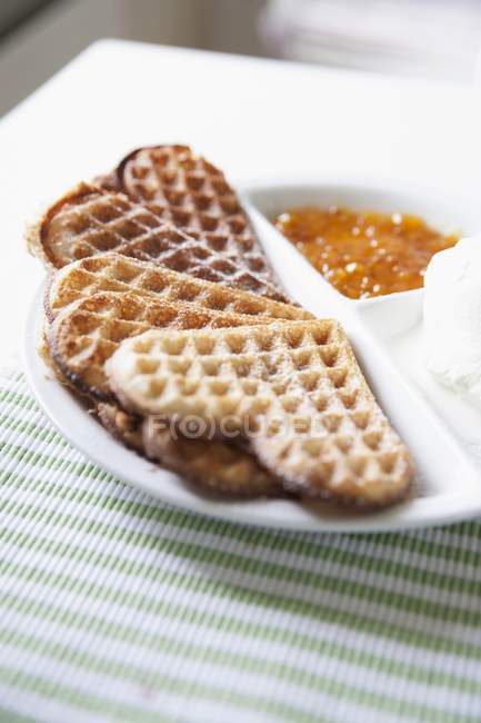 Heart-shaped waffles with vanilla ice cream — Stock Photo